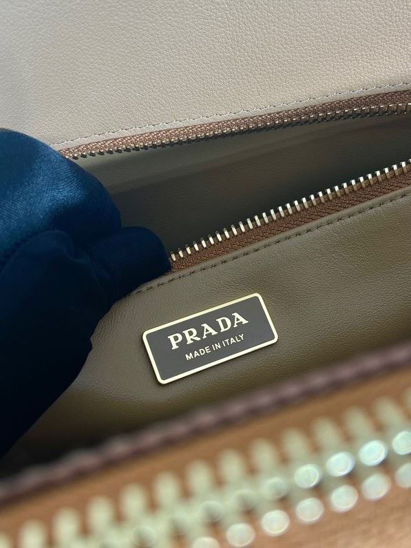 Pra*a top handle bags